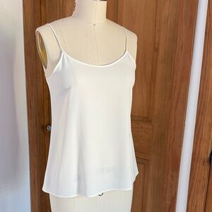 Elegant crème Uniqlo Spaghetti Strap Top. Spandex crepe fabric. Small. New tags